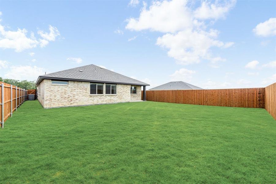 Exterior details and patio area of a home in Georgetown at Kings Fort, Kaufman (Image 28).