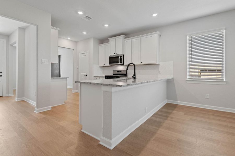 Furnished interior view inside a new home in Emberly, Beasley (Image 8).