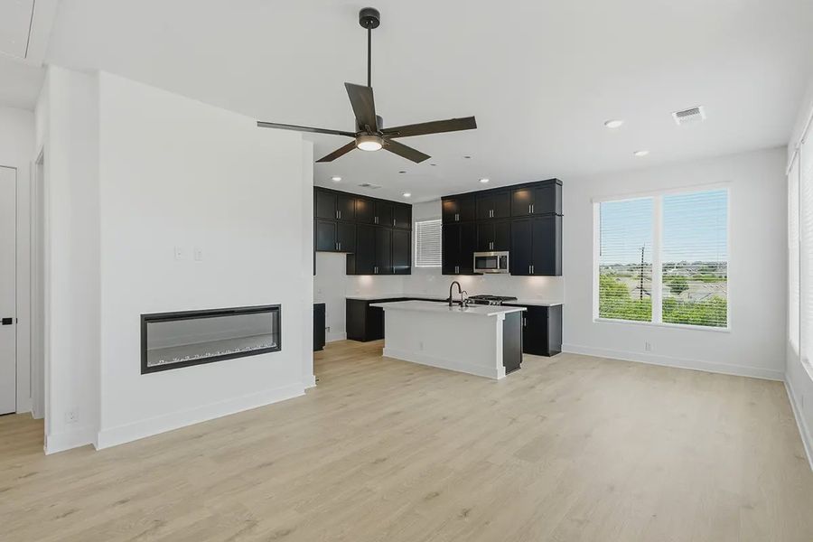 Representative furnished interior of a home built from the Athena by Chesmar Homes in Prominence Urban, San Antonio (Image 12).