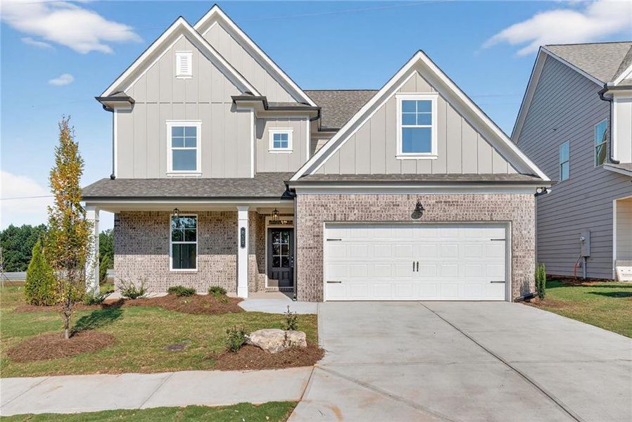Front exterior of a new home in , Buford, GA, highlighting curb appeal (Image 1).