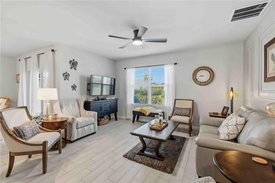 Furnished interior view inside a new home in Burnt Store Village, Punta Gorda (Image 9).