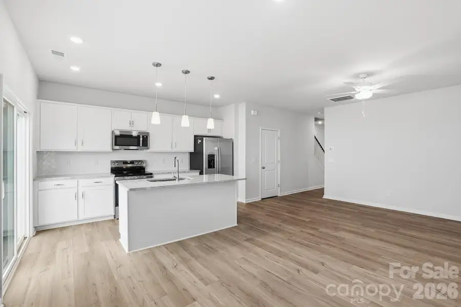 Furnished interior view inside a new home in Sloan Station, Charlotte (Image 5).