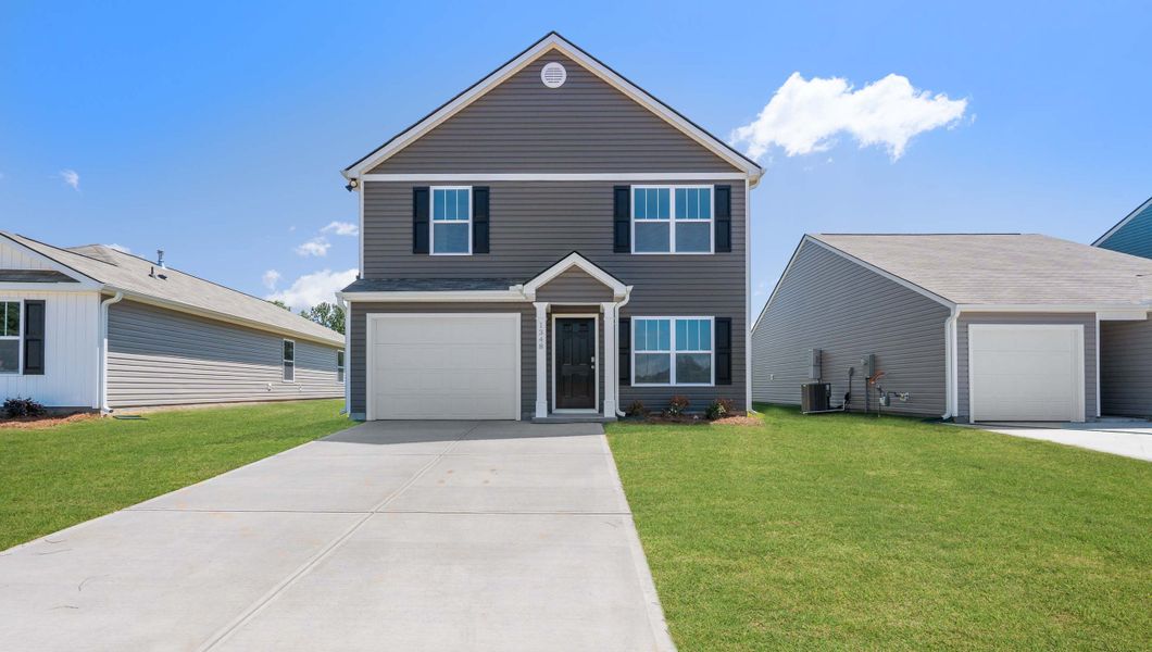 Front exterior of a new home in Harper Ridge, Roebuck, SC, highlighting curb appeal (Image 1).