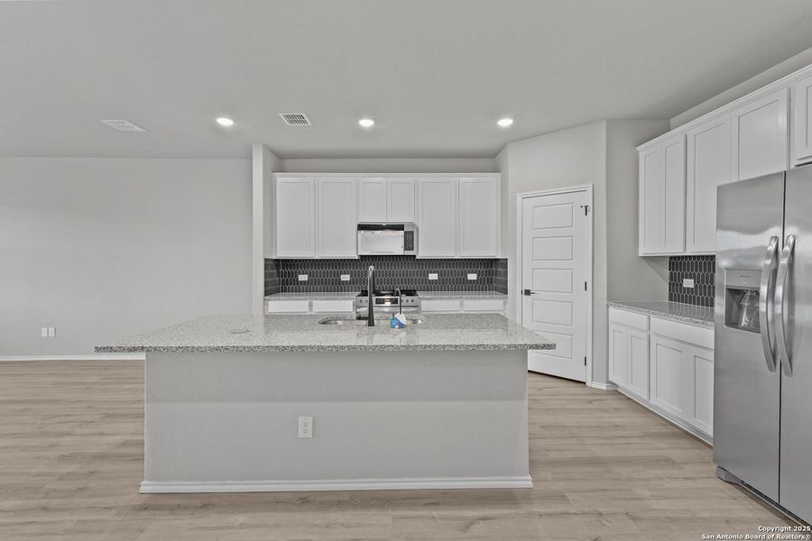 Furnished interior view inside a new home in Comanche Ridge, San Antonio (Image 48). Furnished interior view inside a new home in Comanche Ridge, San Antonio (Image 48).