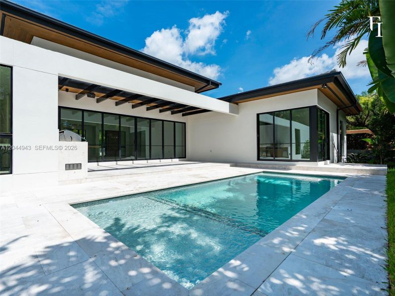 Exterior details and patio area of a home in , Coral Gables (Image 34). Exterior details and patio area of a home in , Coral Gables (Image 34).