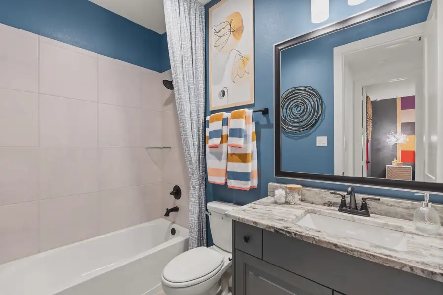 Representative furnished interior of a home built from the Draco by Chesmar Homes in Broken Oak, Georgetown (Image 4).