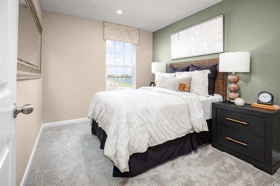 Furnished interior view inside a new home in Pine Pointe at Astonia, Davenport (Image 9).