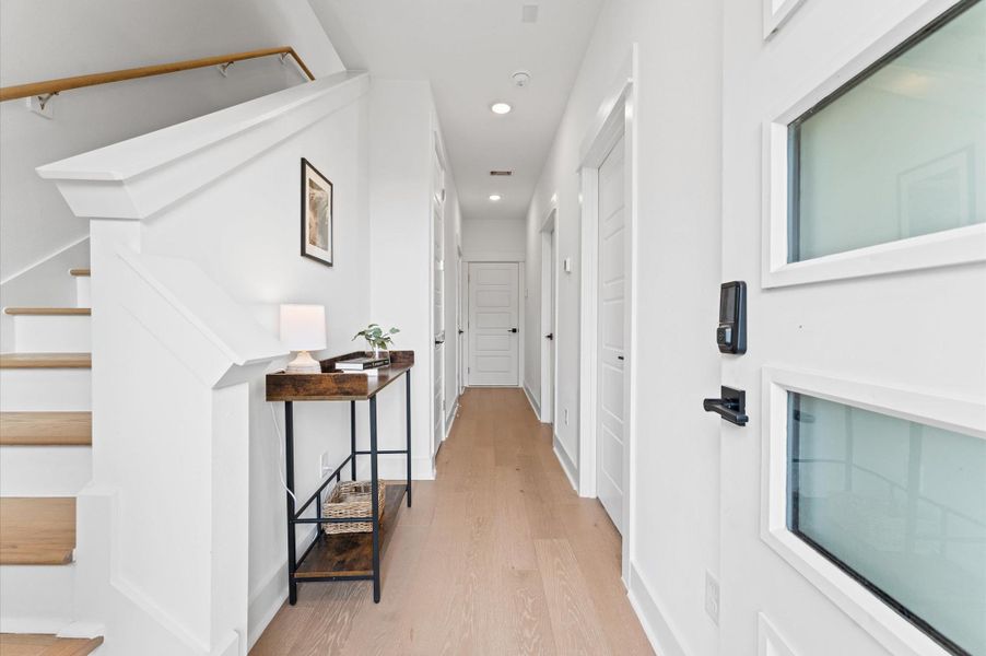 This inviting home features two spacious secondary bedrooms located on the first floor, offering privacy and convenience for guests, family members, or a home office setup. A full bathroom is thoughtfully positioned nearby, providing easy access and functionality. Whether used for multi-generational living or flexible space needs, this layout enhances comfort and accessibility without compromising style.