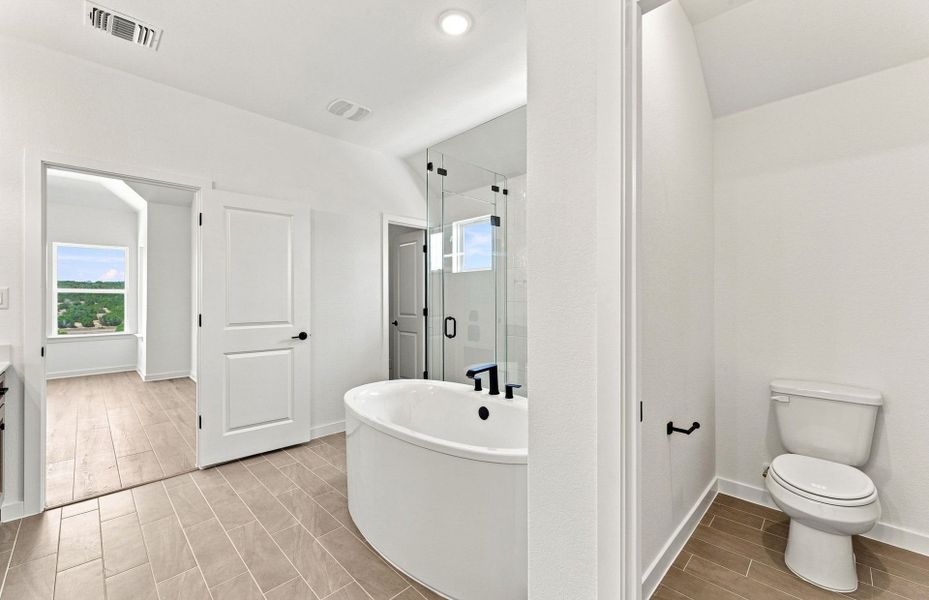 Representative furnished interior of a home built from the Elliott by Pulte Homes in West Cypress Hills, Spicewood (Image 12).