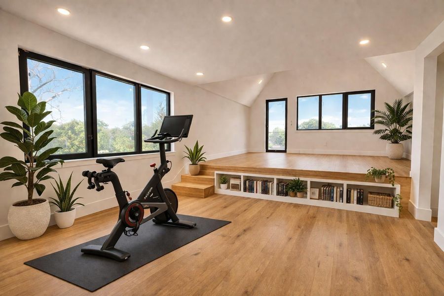 Spacious primary suite with room for a sitting area or gym space, offering comfort, privacy, and access to a private balcony for your own peaceful escape.
