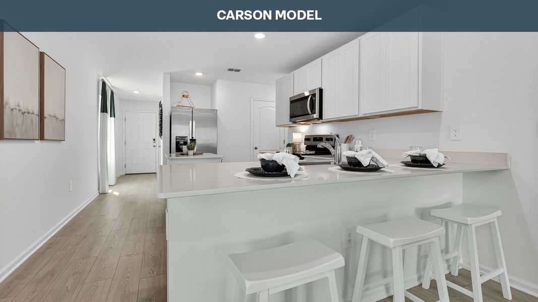 Representative furnished interior of a home built from the CARSON by D.R. Horton in Hansen Creek, Jacksonville (Image 5).