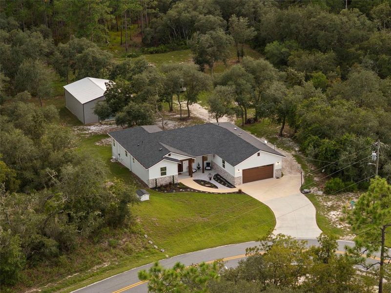 Front exterior of a new home in , Webster, FL, highlighting curb appeal (Image 22).