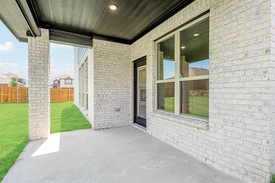 Exterior details and patio area of a home in Maplewood, Glenn Heights (Image 3). Exterior details and patio area of a home in Maplewood, Glenn Heights (Image 3).