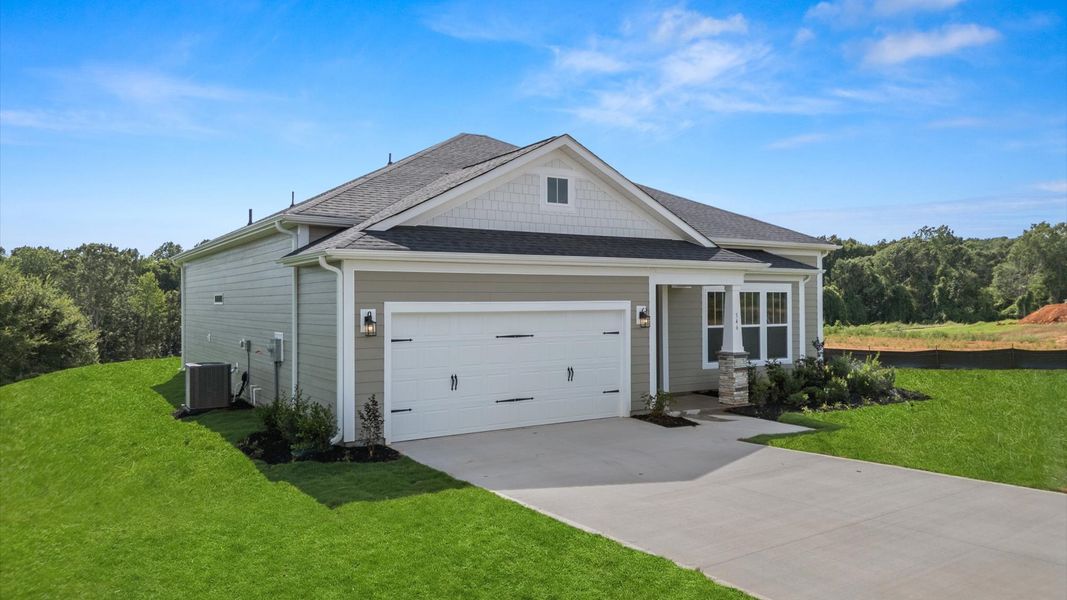 Front exterior of a new home in Pinebrook, Woodruff, SC, highlighting curb appeal (Image 21).