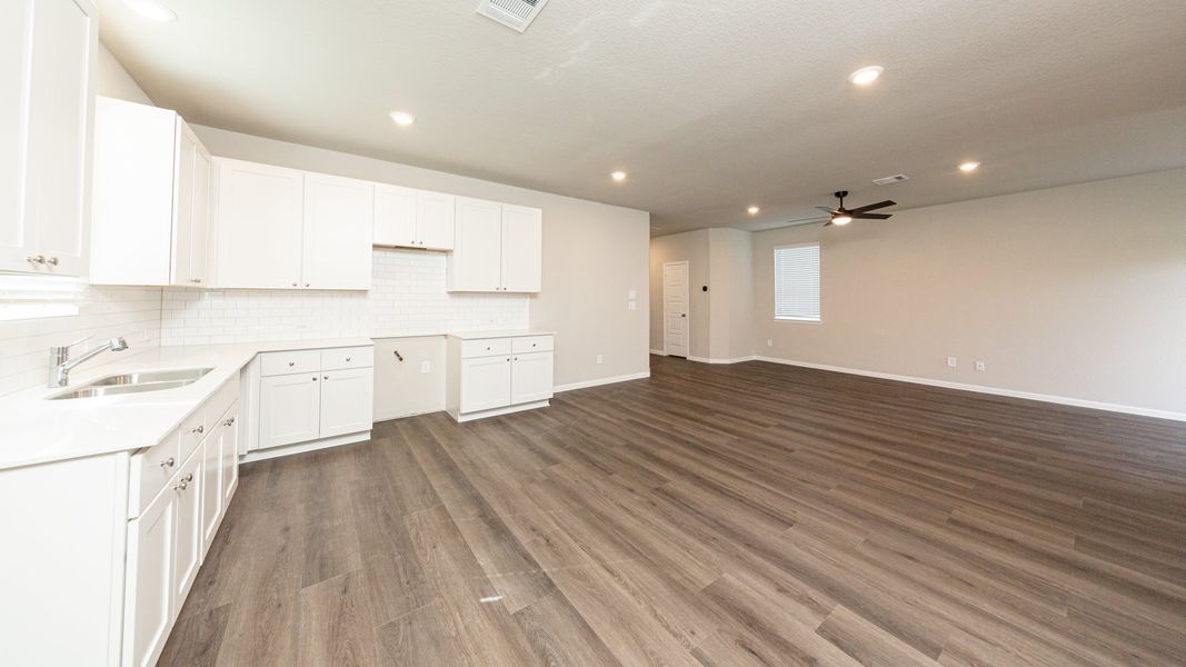 Kitchen to Dining Area and Family Room