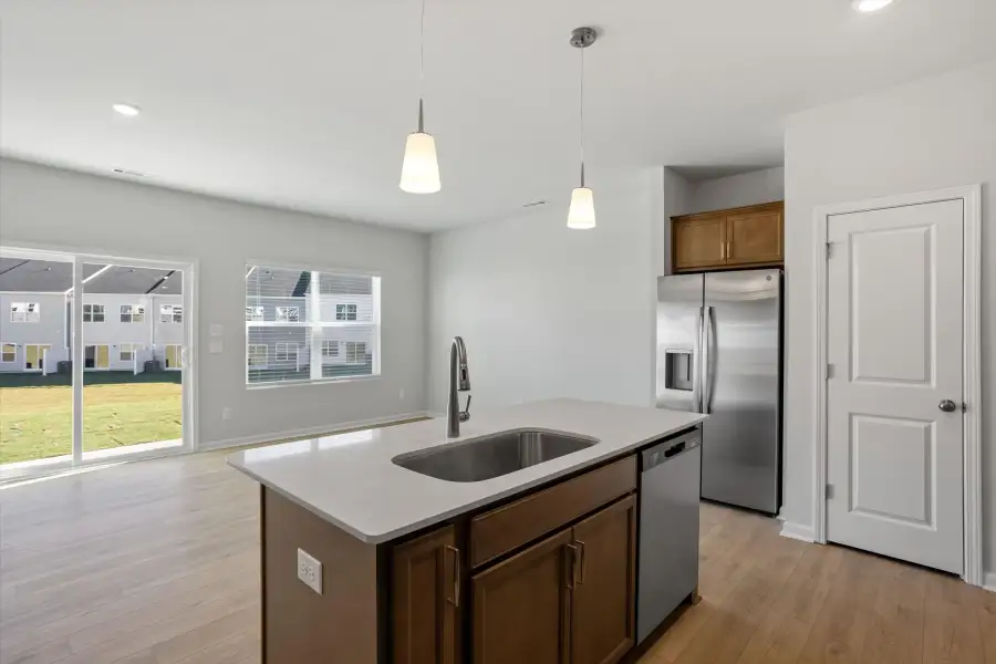 Furnished interior view inside a new home in West Main Townhomes, Sanford (Image 9).