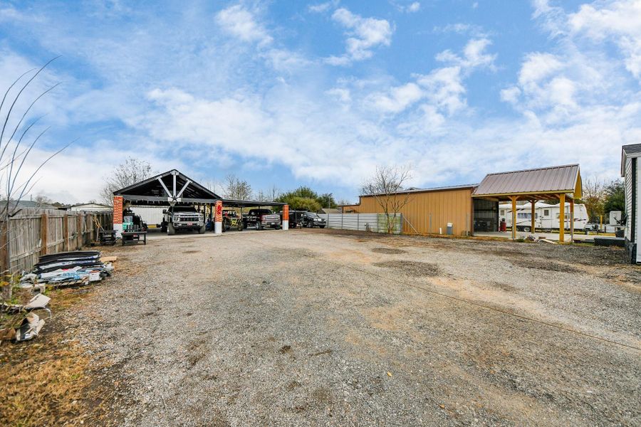 Front exterior of a new home in , Cleveland, TX, highlighting curb appeal (Image 22).