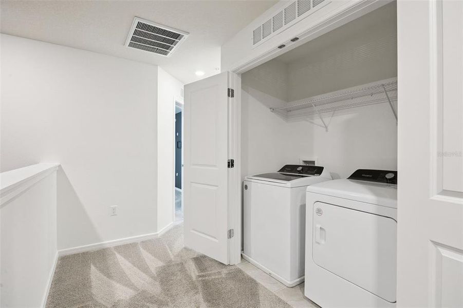 Furnished interior view inside a new home in Grayson Square, Winter Park (Image 6). Furnished interior view inside a new home in Grayson Square, Winter Park (Image 6).