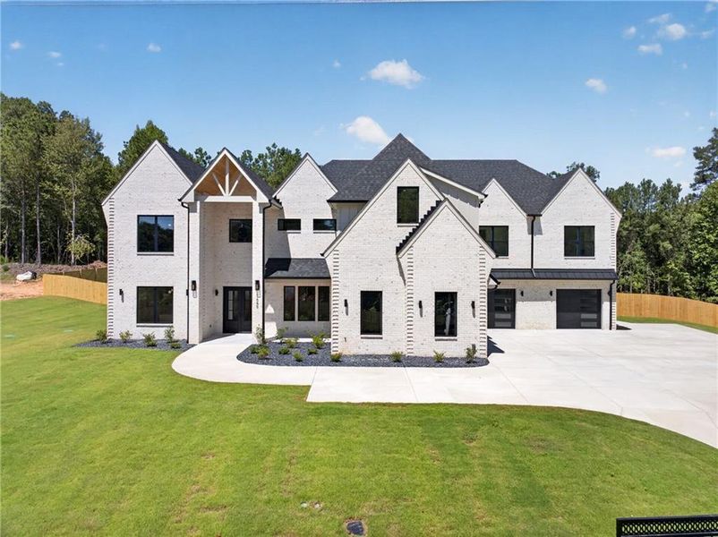 Front exterior of a new home in , Dacula, GA, highlighting curb appeal (Image 29).