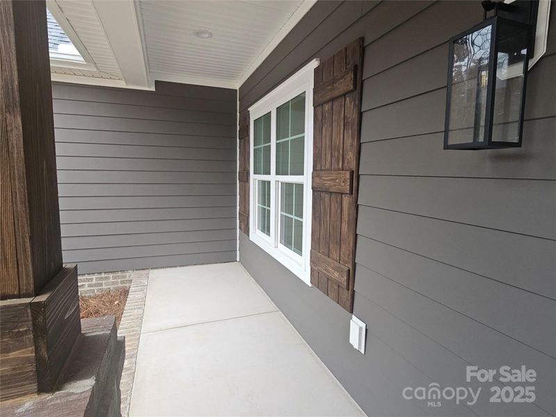 Exterior details and patio area of a home in , Midland (Image 3).
