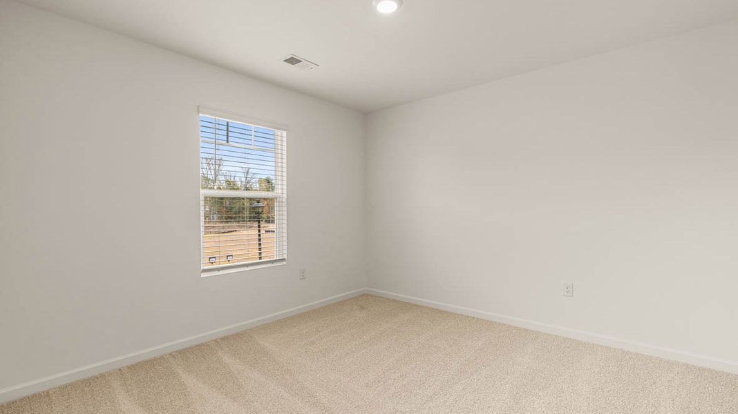Representative unfurnished interior of a home built from the Dennis by D.R. Horton in Glenmaye, Hampton (Image 28).