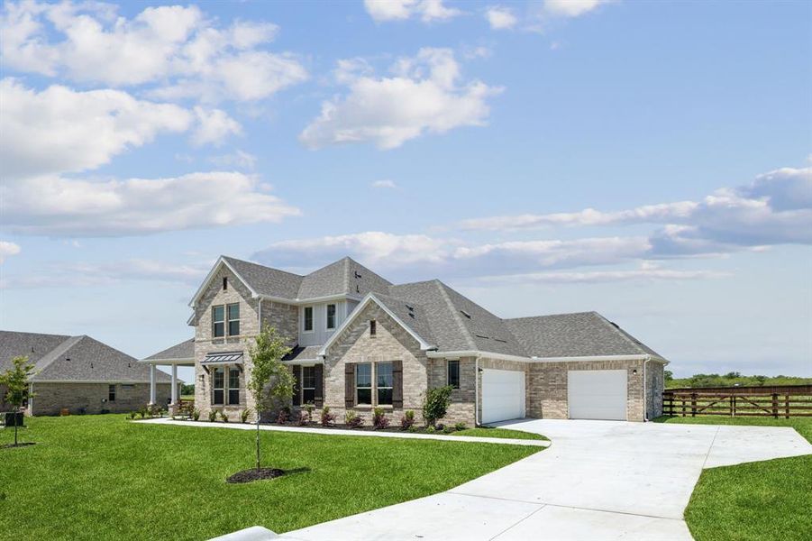 Front exterior of a new home in Ellis Ranch Estates, Waxahachie, TX, highlighting curb appeal (Image 19).