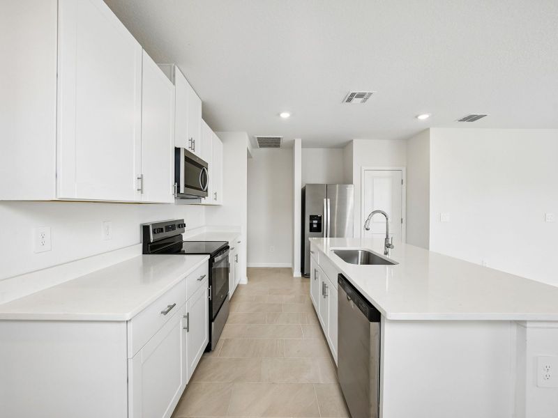 Furnished interior view inside a new home in Two Rivers - Premier Series, Zephyrhills (Image 6).