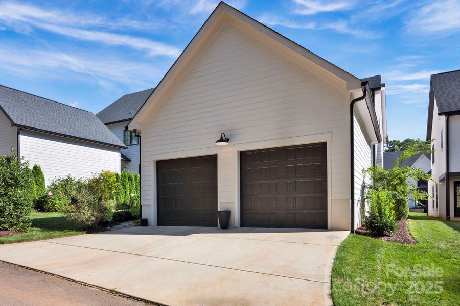 Front exterior of a new home in , Davidson, NC, highlighting curb appeal (Image 22).