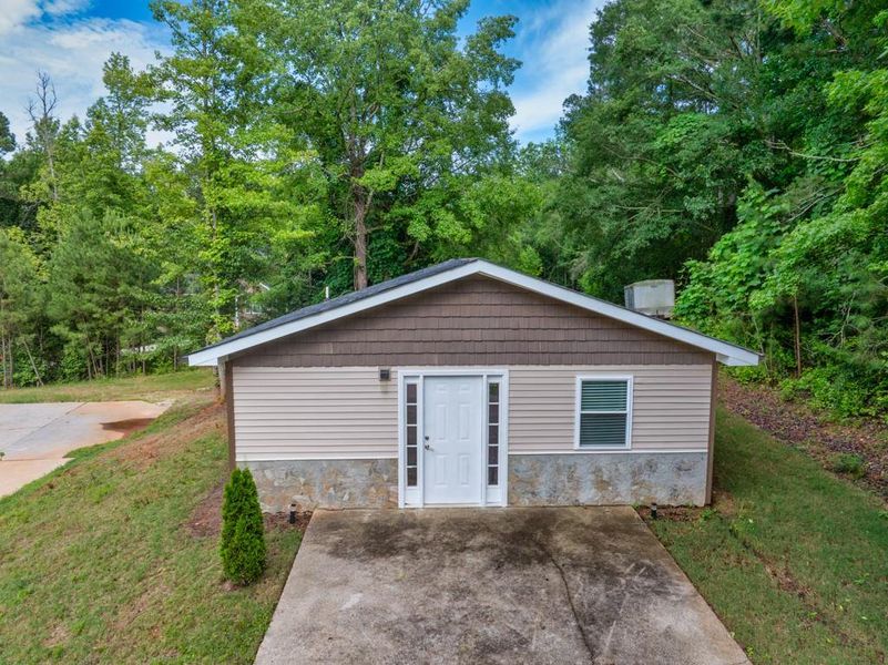 Front exterior of a new home in , Oxford, GA, highlighting curb appeal (Image 26).