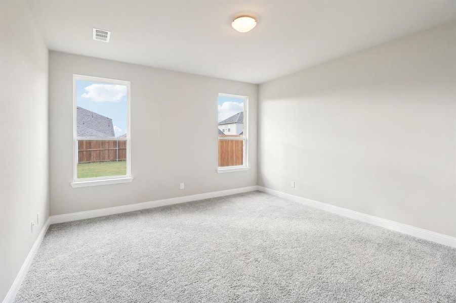 Empty room featuring carpet floors