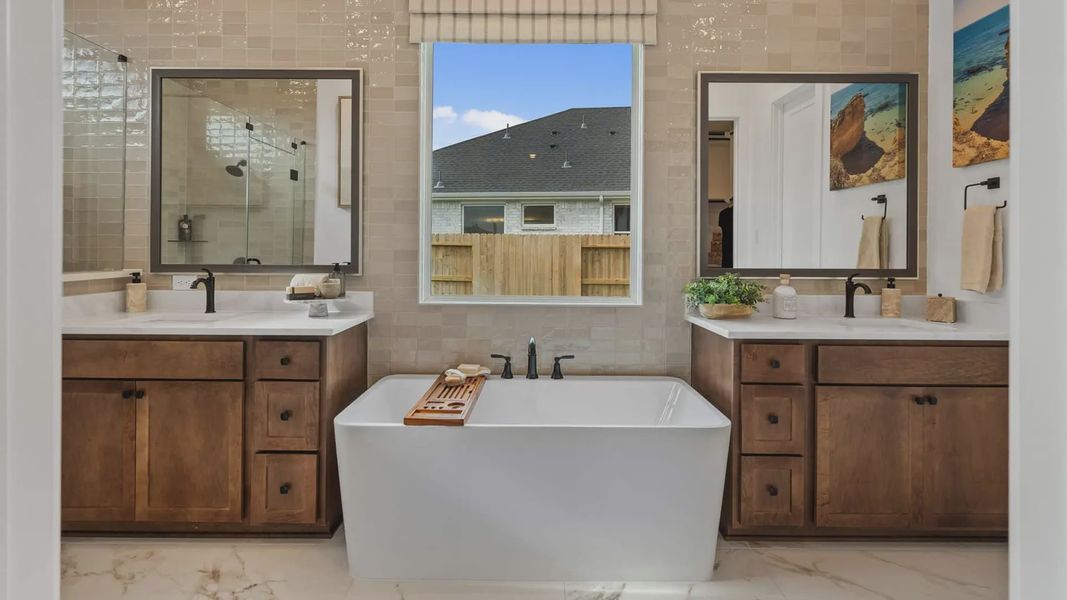 Representative furnished interior of a home built from the Acadia by Chesmar Homes in Elyson 50's, Katy (Image 19).