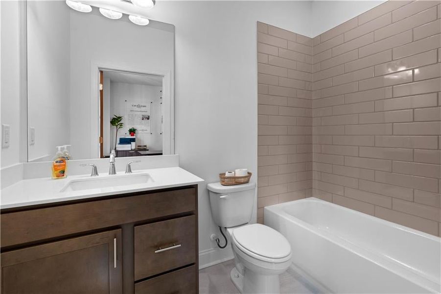 Full Bathroom on Terrace Level *Images shown are from a decorated model of the same floor plan. Design selections and color packages will vary by home.*