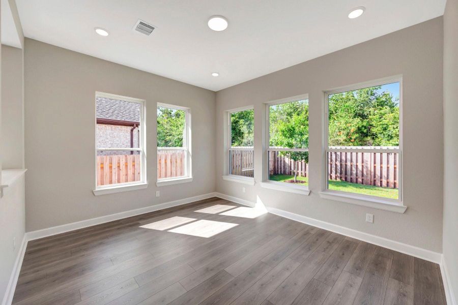The amazing Sunroom feels like Grandma's porch (but with AC!).  Surrounded by windows, you feel like you are sitting outside!