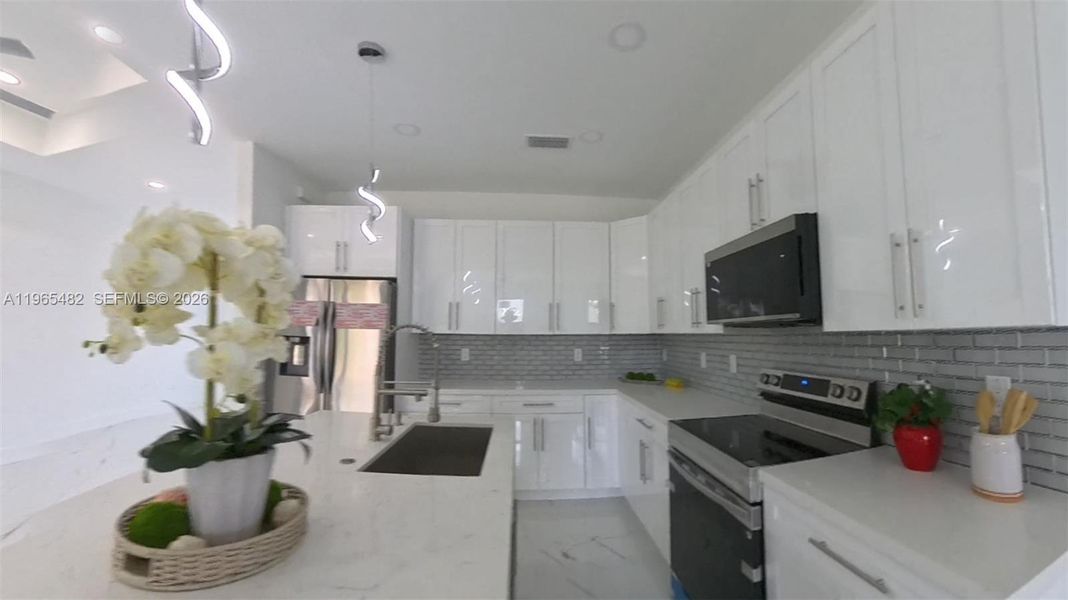 Furnished interior view inside a new home in , Lehigh Acres (Image 12).
