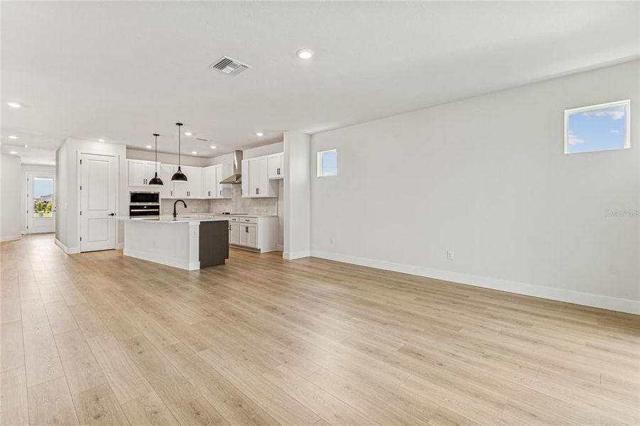 Spacious, unfurnished interior of a new home in North River Ranch - Cottage Series, Parrish (Image 23).