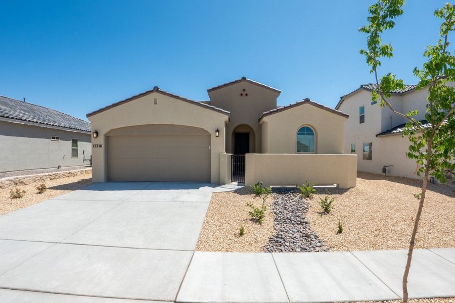 Front exterior of a new home in Emerald Estates, El Paso, TX, highlighting curb appeal (Image 19).