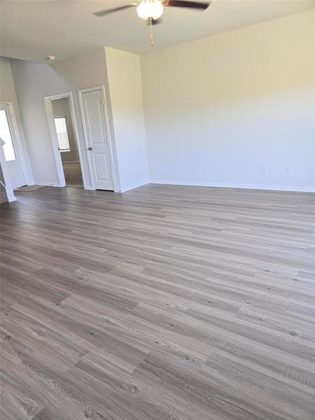 Not a fan of carpet? This living room features vinyl plank which gives the home that modern look.