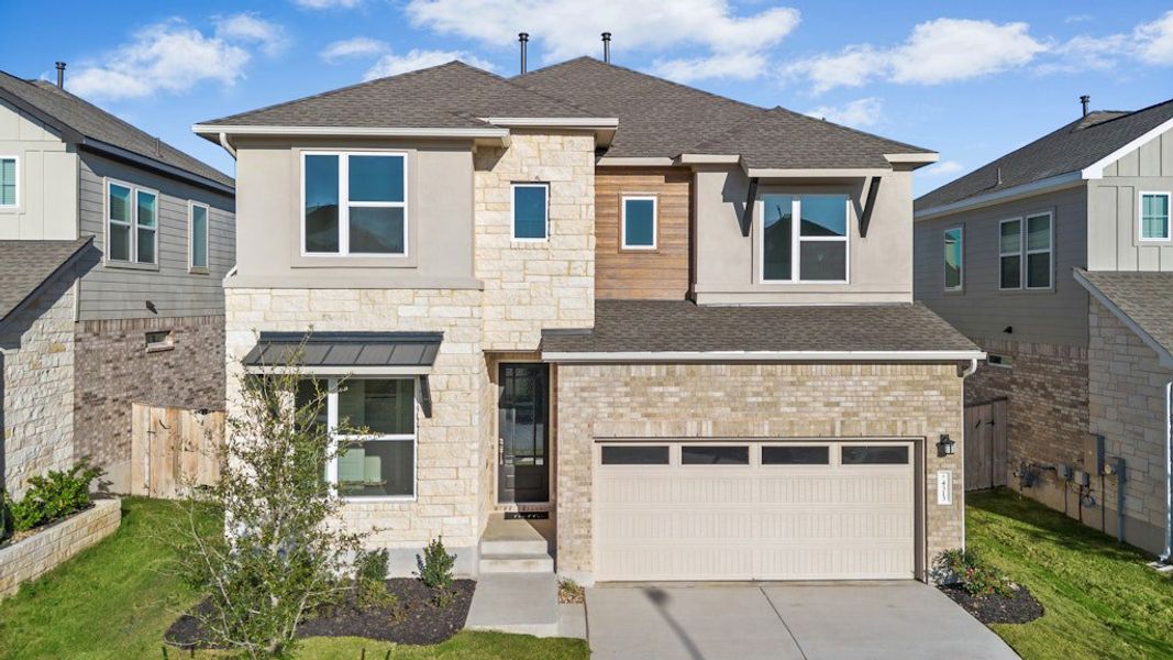 Front exterior of a new home in University Heights, Round Rock, TX, highlighting curb appeal (Image 20).