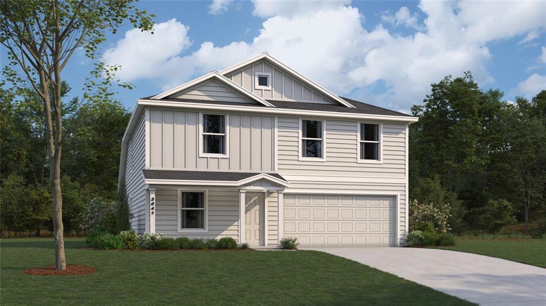 View of front of property with a front yard and a garage