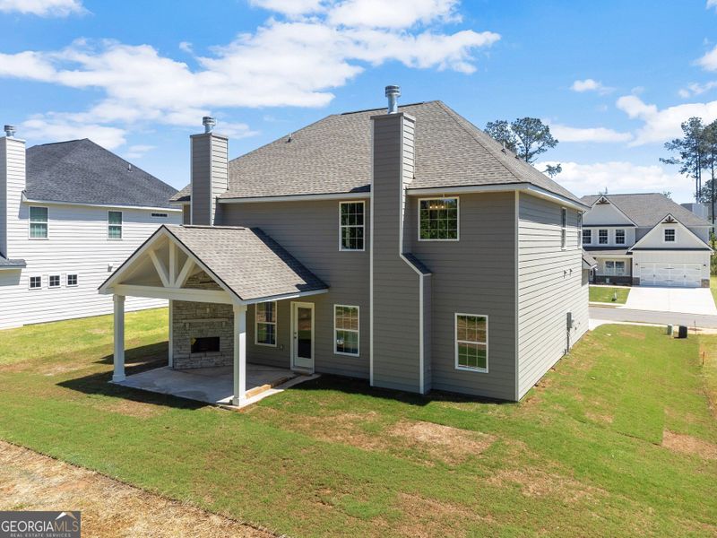 Exterior details and patio area of a home in Juliette Crossing, Forsyth (Image 31).