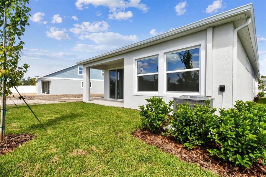 Exterior details and patio area of a home in Chapel Crossings - Garden Series, Wesley Chapel (Image 4).