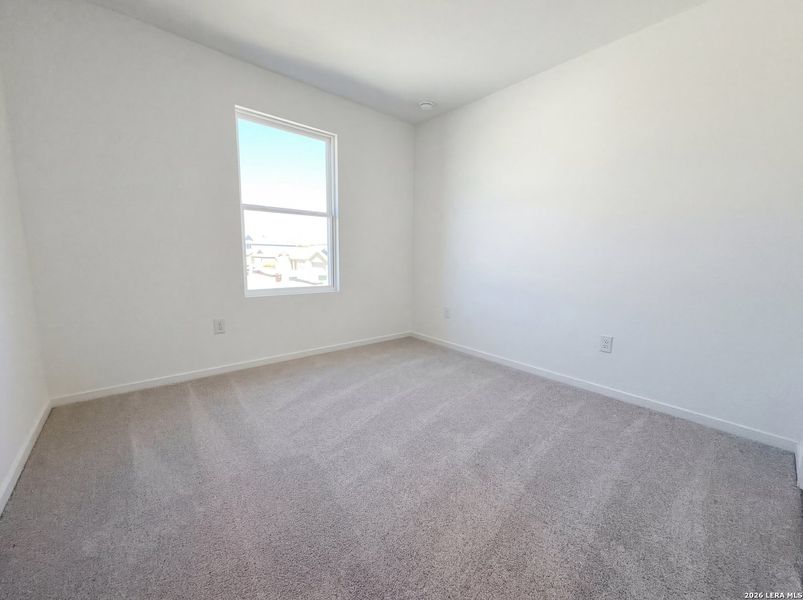 Spacious, unfurnished interior of a new home in Hunters Ranch, San Antonio (Image 10).