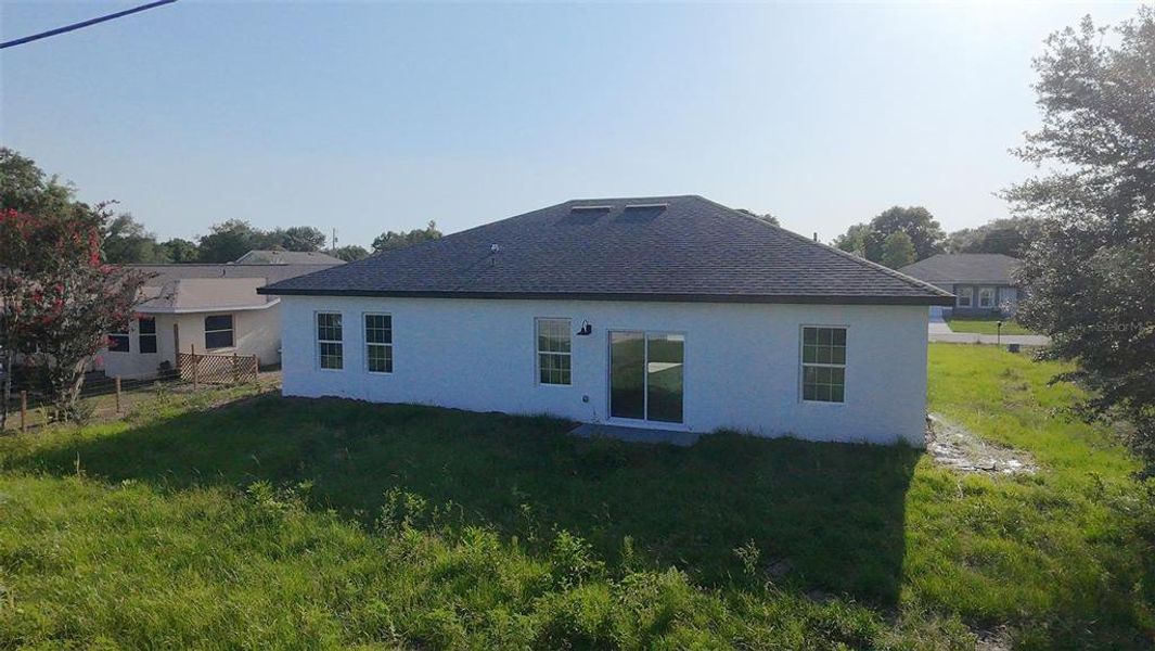 Front exterior of a new home in , Ocala, FL, highlighting curb appeal (Image 16). Front exterior of a new home in , Ocala, FL, highlighting curb appeal (Image 16).