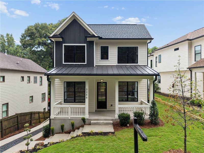 Front exterior of a new home in , Scottdale, GA, highlighting curb appeal (Image 2). Front exterior of a new home in , Scottdale, GA, highlighting curb appeal (Image 2).