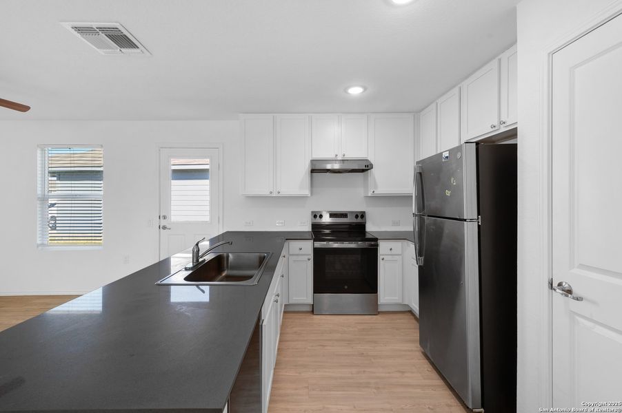 Furnished interior view inside a new home in , San Antonio (Image 6).
