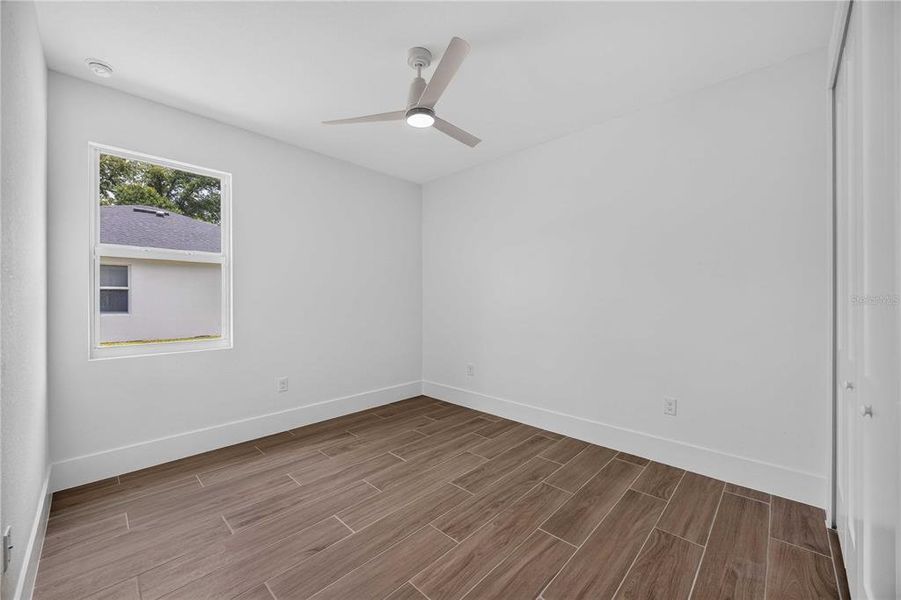 Spacious, unfurnished interior of a new home in , Port Charlotte (Image 24).