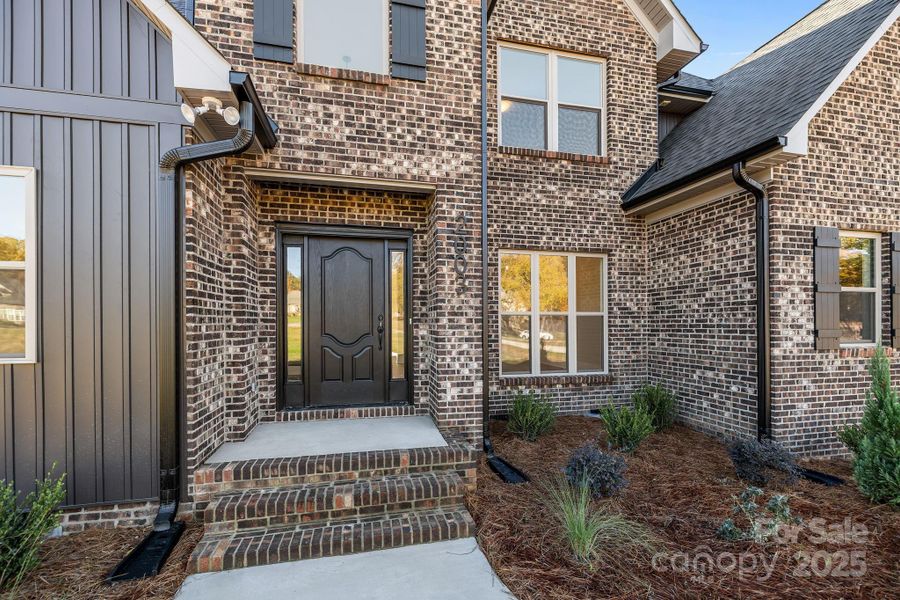 Exterior details and patio area of a home in , Monroe (Image 4).