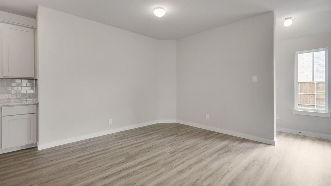 Representative furnished interior of a home built from the Driskill by Brightland Homes in Cielo, Conroe (Image 7).
