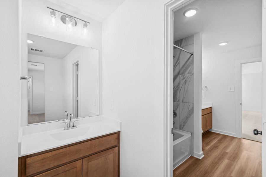 Furnished interior view inside a new home in Lone Star Landing, Montgomery (Image 12).