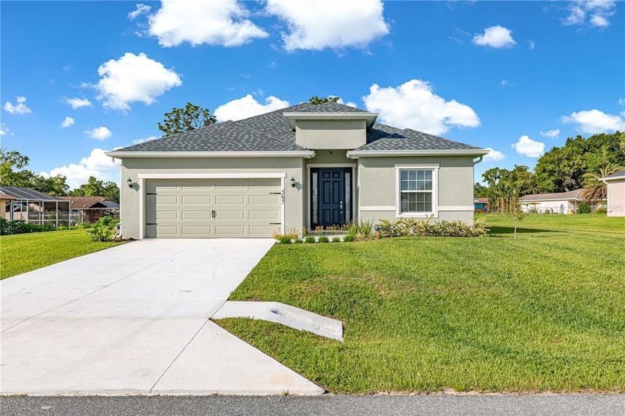 Front exterior of a new home in , Ocala, FL, highlighting curb appeal (Image 29).